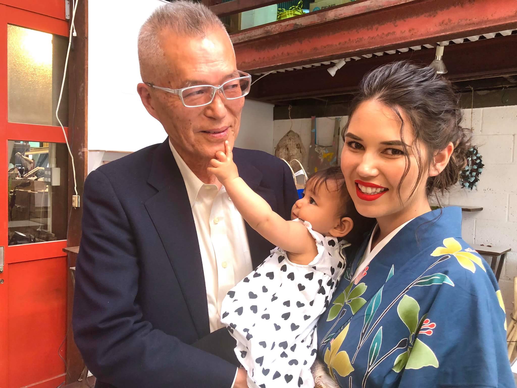 grandfather with daughter and grandbaby
